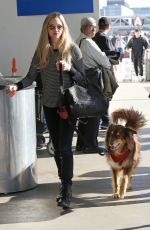 AMANDA SEYFRIED and Her Dog at LAX Airport in Los Angeles 11/27/2017