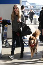 AMANDA SEYFRIED and Her Dog at LAX Airport in Los Angeles 11/27/2017