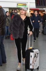 AMBER TURNER at Heathrow Airport in London 12/142017