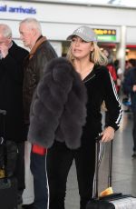 AMBER TURNER at Heathrow Airport in London 12/142017