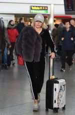AMBER TURNER at Heathrow Airport in London 12/142017