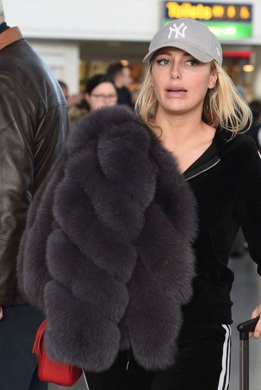 AMBER TURNER at Heathrow Airport in London 12/142017