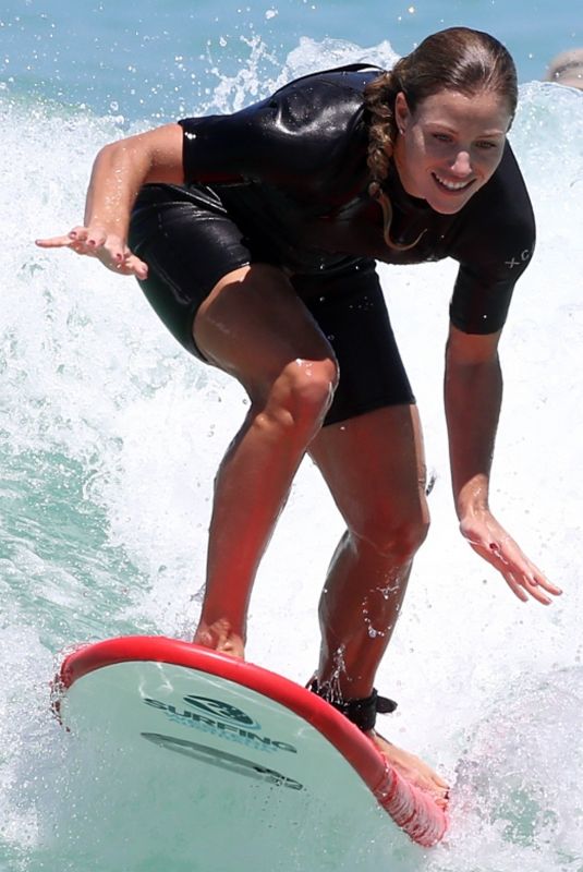 ANGELIQUE KERBER Surfing at Trigg Beach in Perth 12/30/2017