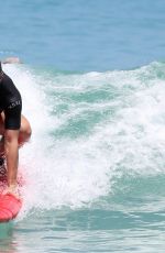 ANGELIQUE KERBER Surfing at Trigg Beach in Perth 12/30/2017