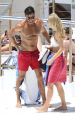 ANNA HEINRICH and Tim Robards at Bondi Beach in Sydney 12/27/2017