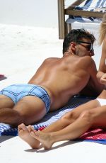 ANNA HEINRICH and Tim Robards at Bondi Beach in Sydney 12/27/2017