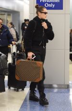 BELLA HADID at JFK Airport in New York 12/10/2017