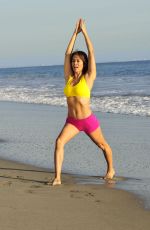 BROOKE BURKE in the Set of Her Brooke Burke Body App at a Beach in Malibu 11/30/2017