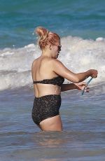 BUSY PHILIPPS in Bikini at a Beach in Mexico 12/21/2017