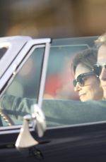 CINDY CRAWFORD and Rande Gerber in Classic Corvette Convertible Driving Out in Malibu 12/23/2017