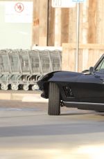 CINDY CRAWFORD and Rande Gerber in Classic Corvette Convertible Driving Out in Malibu 12/23/2017