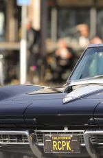 CINDY CRAWFORD and Rande Gerber in Classic Corvette Convertible Driving Out in Malibu 12/23/2017