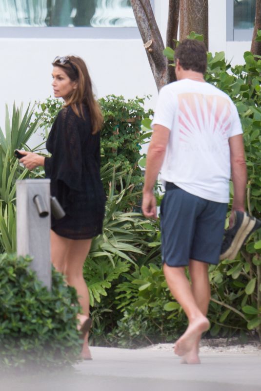 CINDY CRAWFORD and Rande Gerber Out in Miami 12/07/2017