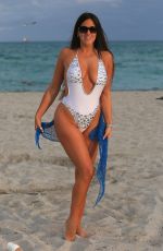 CLAUDAI ROMANI in Swimsuit at a Beach in Miami 12/17/2017