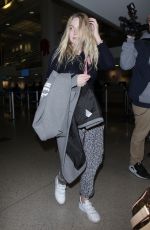 DAKOTA FANNING at LAX Airport in Los Angeles 12/19/2017