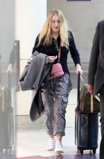 DAKOTA FANNING at LAX Airport in Los Angeles 12/19/2017