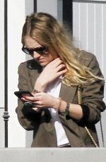 DAKOTA FANNING Leaves Her Home in Los Angeles 12/20/2017