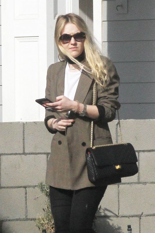 DAKOTA FANNING Leaves Her Home in Los Angeles 12/20/2017