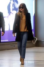 DAKOTA JOHNSON at Charles De Gaulle Airport in Paris 12/19/2017