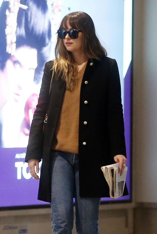 DAKOTA JOHNSON at Charles De Gaulle Airport in Paris 12/19/2017