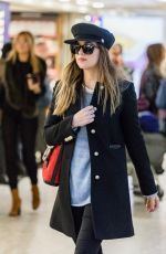 DAKOTA JOHNSON at Heathrow Airport in London 12/14/2017