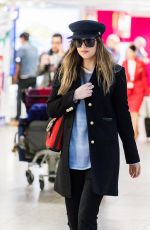 DAKOTA JOHNSON at Heathrow Airport in London 12/14/2017