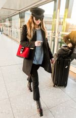 DAKOTA JOHNSON at Heathrow Airport in London 12/14/2017