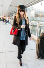 DAKOTA JOHNSON at Heathrow Airport in London 12/14/2017