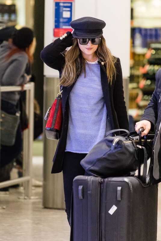 DAKOTA JOHNSON at Heathrow Airport in London 12/14/2017