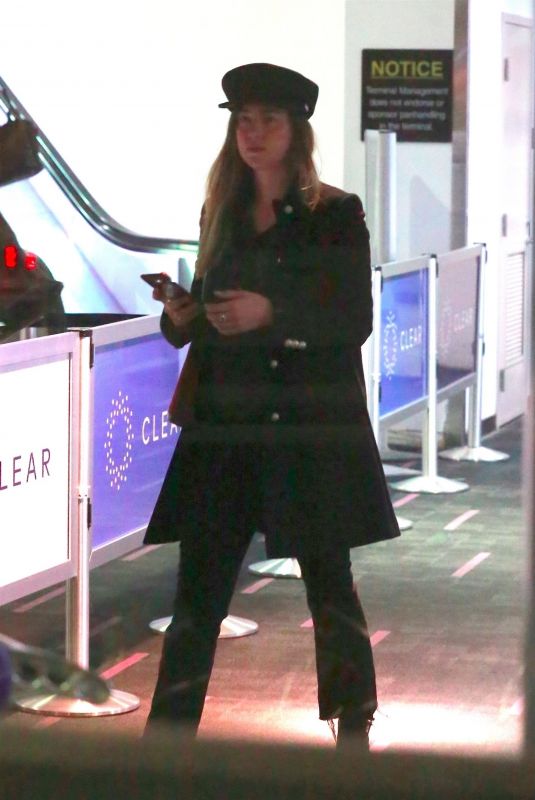DAKOTA JOHNSON at LAX Airport in Los Angeles 12/13/2017