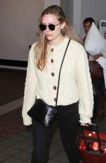 ELIZABETH OLSEN at LAX Airport in Los Angeles 12/01/2017