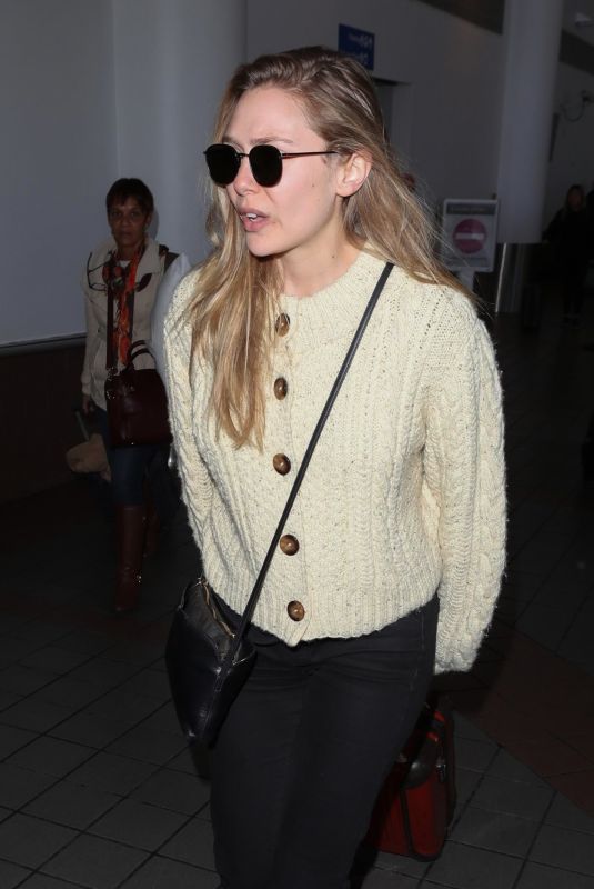 ELIZABETH OLSEN at LAX Airport in Los Angeles 12/01/2017