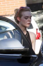 ELLE FANNING in Tights Out in Los Angeles 12/12/2017