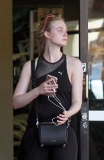 ELLE FANNING in Tights Out in Los Angeles 12/12/2017