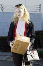 ELLE FANNING Leaves a Ups Store in Studio City 12/29/2017