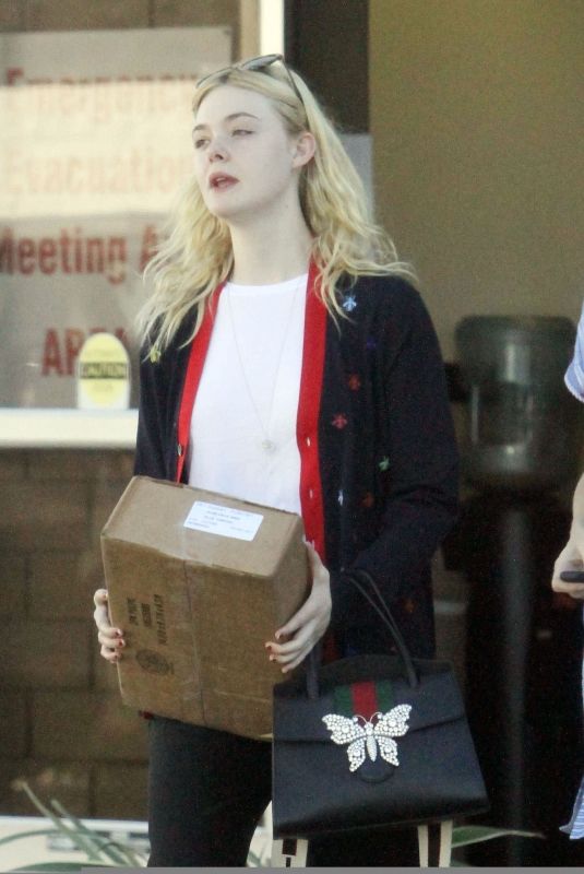 ELLE FANNING Leaves a Ups Store in Studio City 12/29/2017