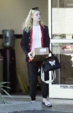 ELLE FANNING Leaves a Ups Store in Studio City 12/29/2017