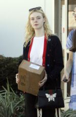 ELLE FANNING Leaves a Ups Store in Studio City 12/29/2017