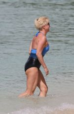 EMMA FORBES in Swimsuit at a Beach in Caribbean 12/26/2017
