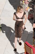 EMMA ROBERTS in Leopard Print Skirt and Top at a Beach in Miami 12/14/2017