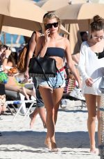 HAILEY BALDWIN in Bikini Top at a Beach in Miami 12/29/2017