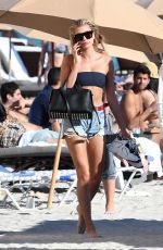 HAILEY BALDWIN in Bikini Top at a Beach in Miami 12/29/2017