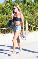 HAILEY BALDWIN in Bikini Top at a Beach in Miami 12/29/2017