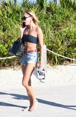 HAILEY BALDWIN in Bikini Top at a Beach in Miami 12/29/2017