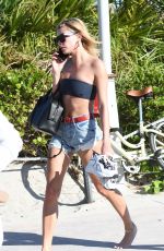 HAILEY BALDWIN in Bikini Top at a Beach in Miami 12/29/2017