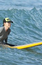 HELEN HUNT in Bikini Top Surfing in Hawaii 12/19/2017