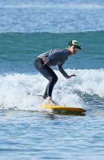 HELEN HUNT in Bikini Top Surfing in Hawaii 12/19/2017