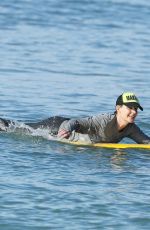 HELEN HUNT in Bikini Top Surfing in Hawaii 12/19/2017