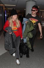 HILARY DUFF and Matthew Coma at LAX Airport in Los Angeles 12/21/2017
