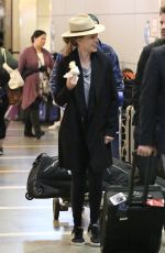 HILARY SWANK and Philip Schneider at LAX Airport in Los Angeles 12/17/2017